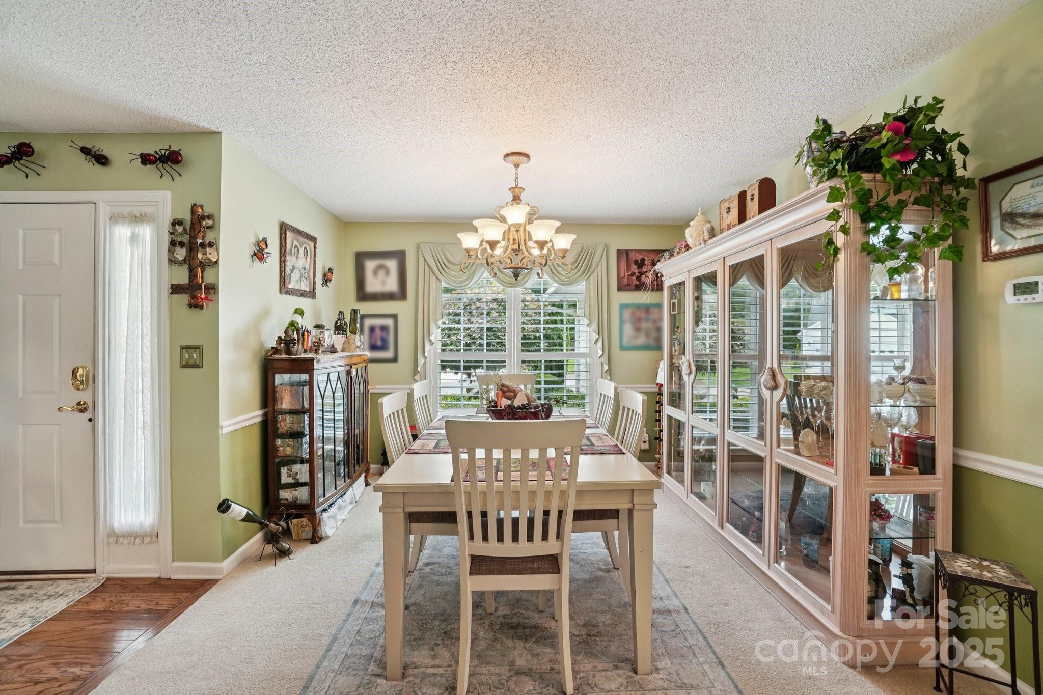 133 Stonehollow Road Fletcher, NC 28732 - Photo 7 of 29 a view of a dining room with furniture window and wooden floor