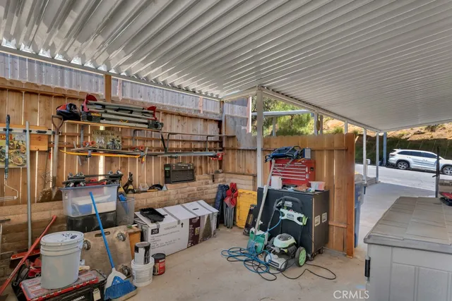 an aerial view of a house with yard swimming pool and outdoor seating