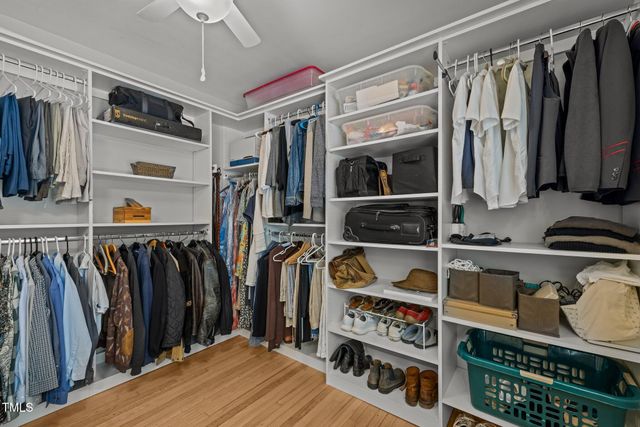 a kitchen with a sink and a mirror