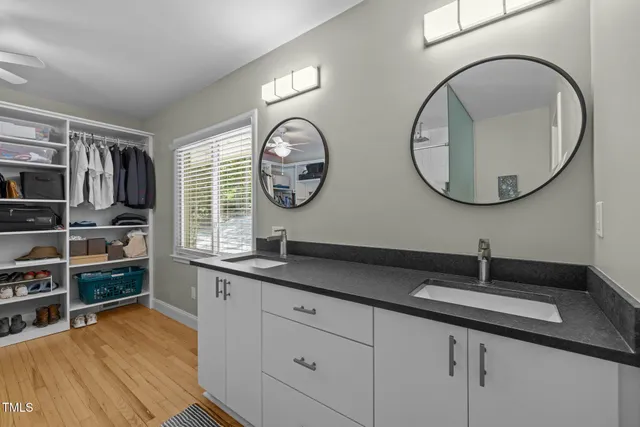 a room that has a bed and a desk in it