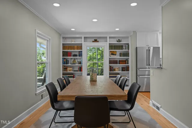 a large kitchen with stainless steel appliances