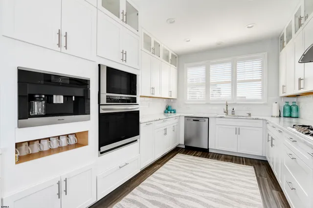 a view of a livingroom with furniture and window