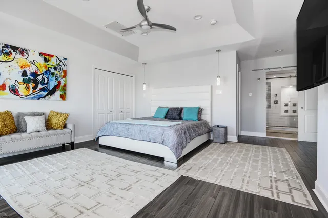 a bathroom with a double vanity sink mirror and shower