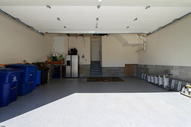 a view of a white building among the street