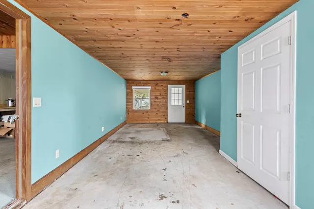 a view of an empty room and window