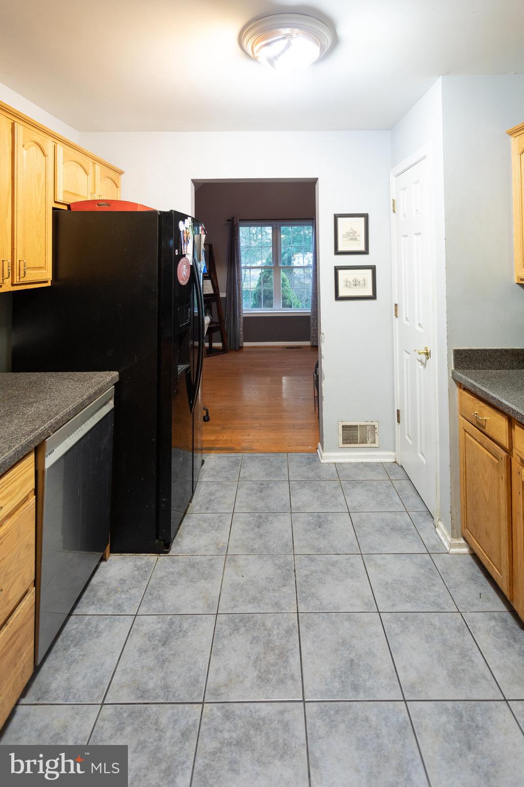 356 North State Road Springfield, PA 19064 - Photo 12 of 26 a view of a refrigerator in kitchen and a window