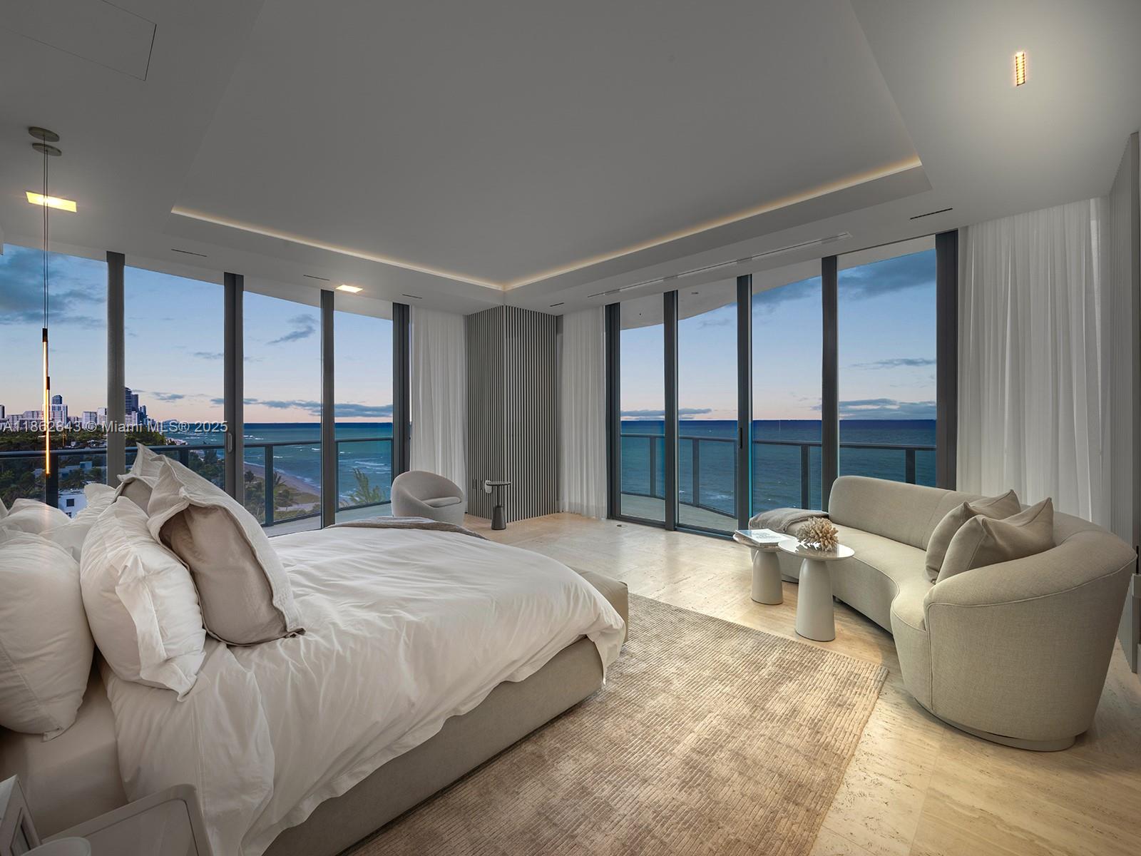 19575 Collins Avenue, Unit 9 Sunny Isles Beach, FL 33160 - Photo 22 of 91 a large bedroom with a large bed and glass window