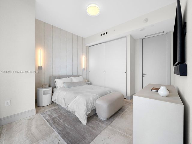 a view of a city with tall buildings