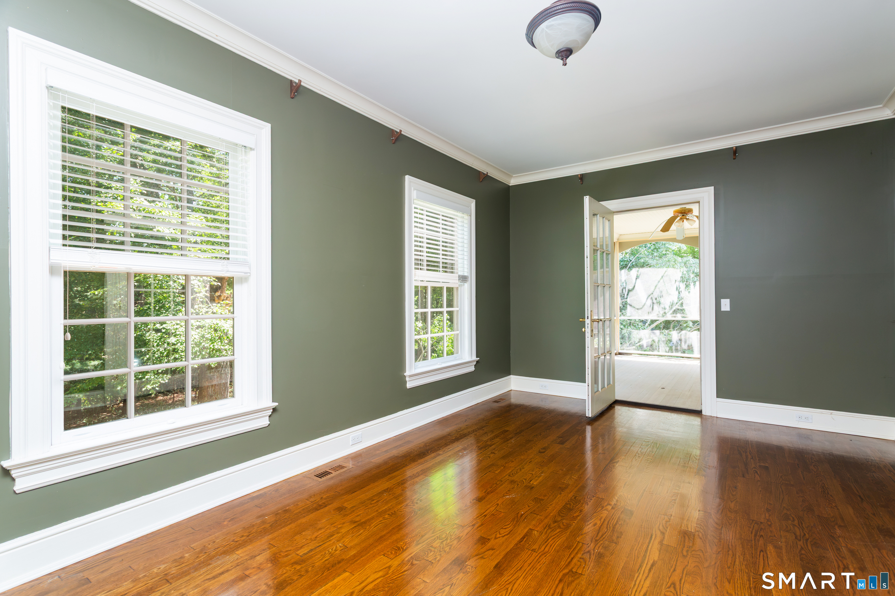 7 Old Hyde Road Weston, CT 06883 - Photo 5 of 40 Study off living room with French door to screened porch