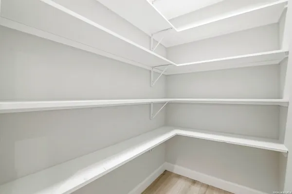 a view of an empty walk in closet