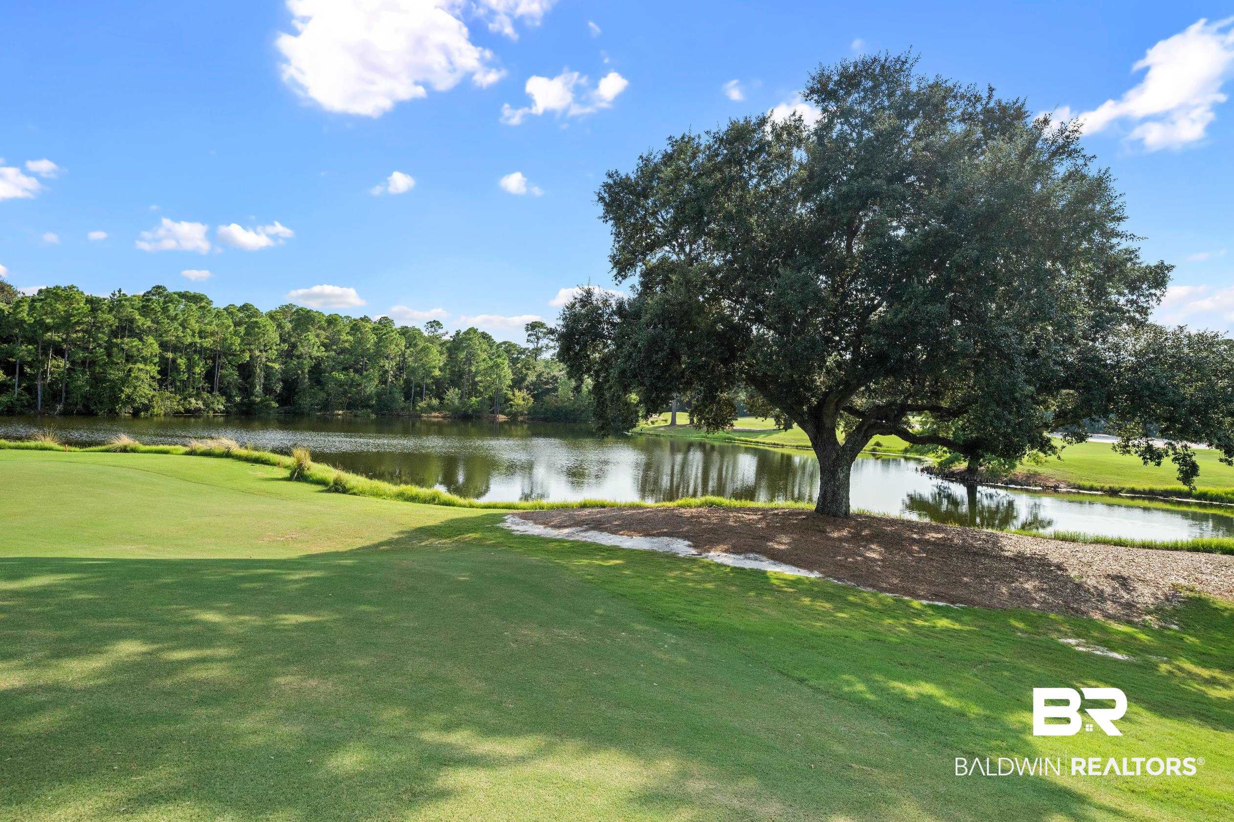 404 Peninsula Boulevard Gulf Shores, AL 36542 - Photo 51 of 51 View of property's community with a water view and a lawn
