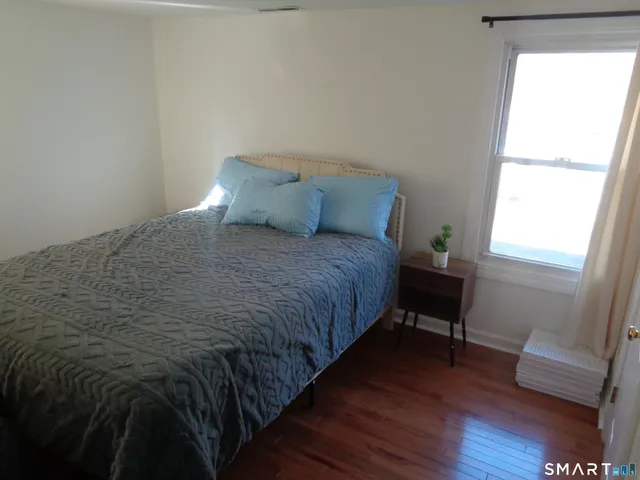 a room with furniture and a window