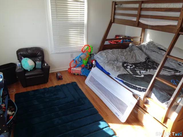 a bathroom with a sink toilet and vanity