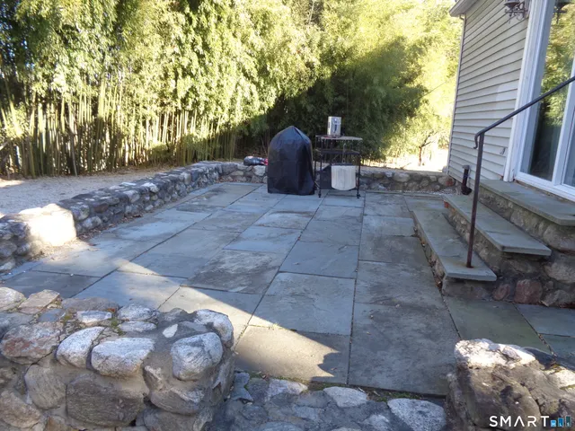 a bathroom with a toilet and a sink