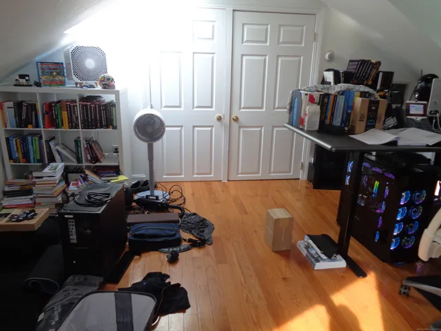 a view of a dining room with furniture and window