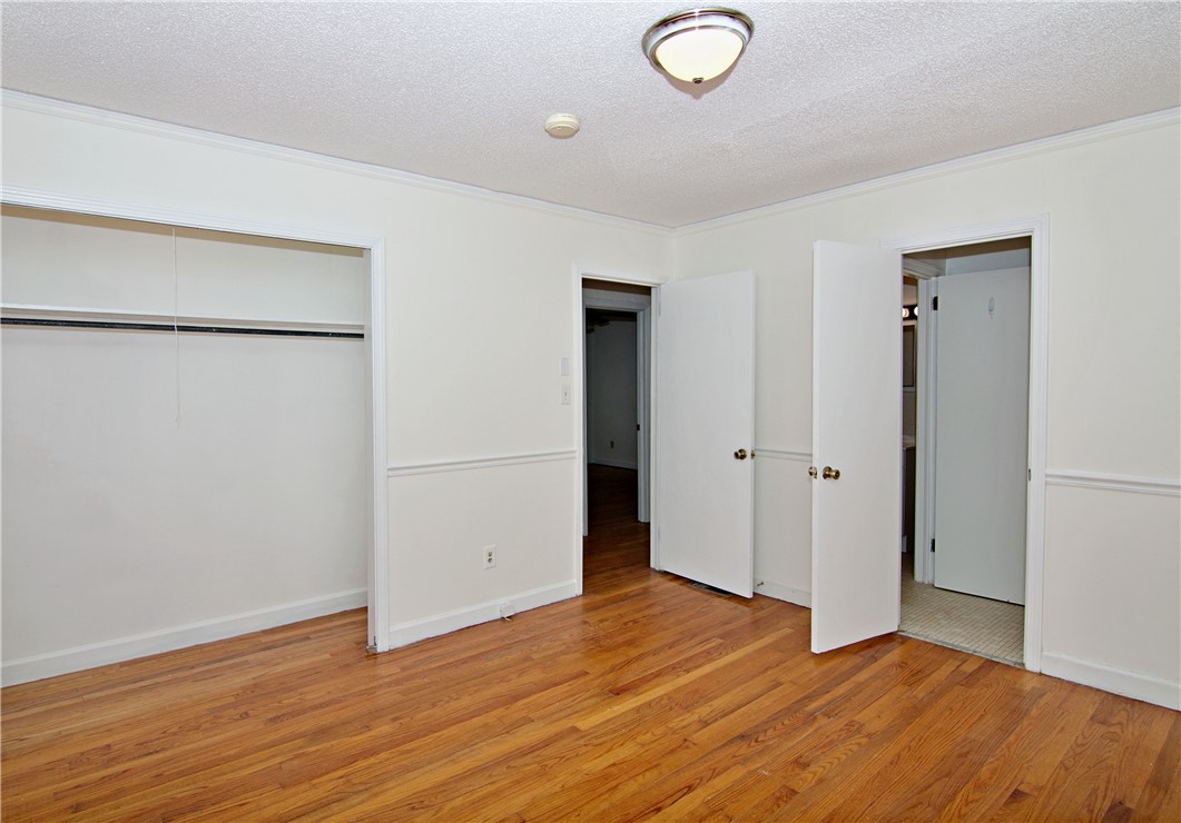 102 Broad Street Clemson, SC 29631 - Photo 28 of 40 Hardwood flooring extends throughout this naturally illuminated bedroom with ample closet space.