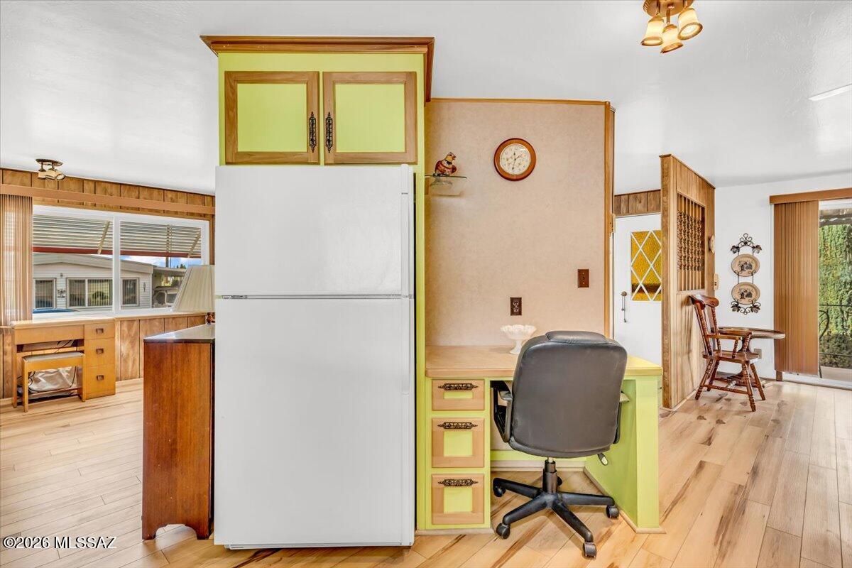 5840 West Flying W Street Tucson, AZ 85713 - Photo 8 of 38 a view of a workspace with furniture and a window