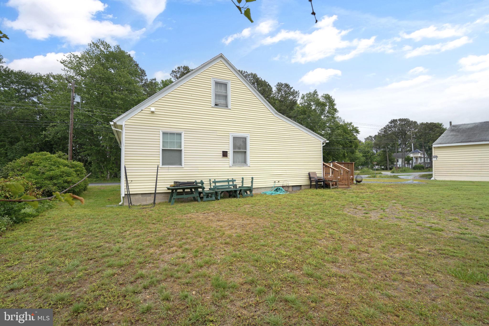 7278 Fleming Road New Church, VA 23415 - Photo 32 of 44 a view of a backyard of the house