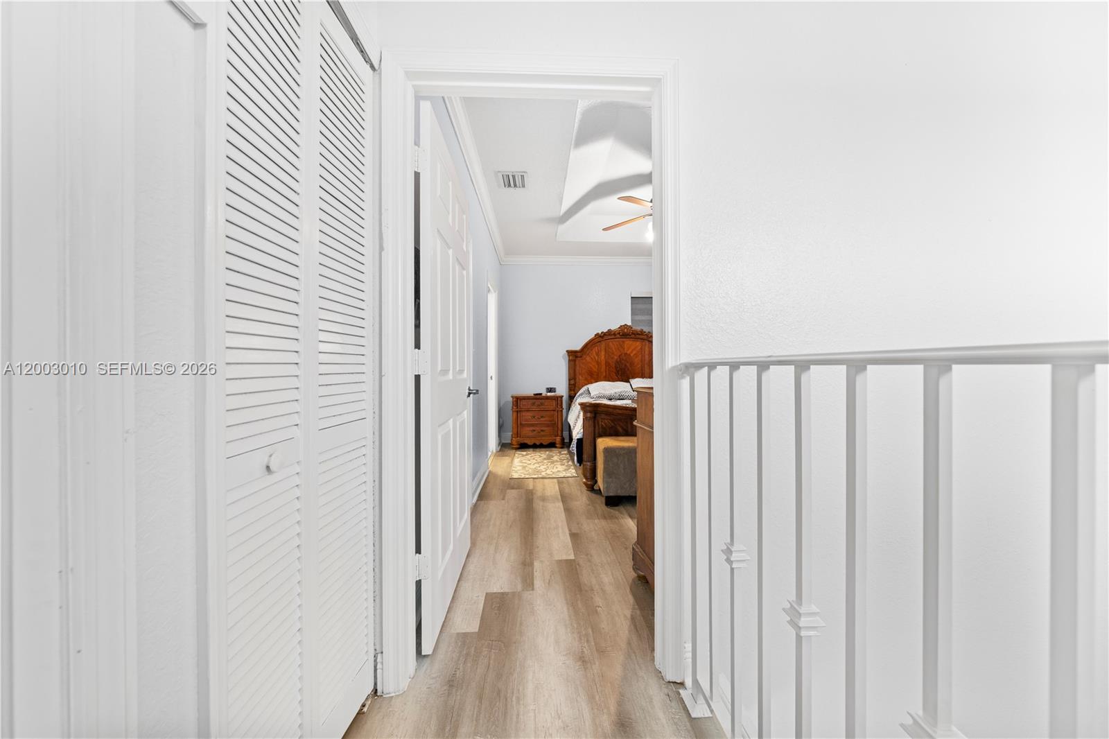 7452 Northwest 178th Street Hialeah, FL 33015 - Photo 13 of 28 a view of a bedroom from a hallway