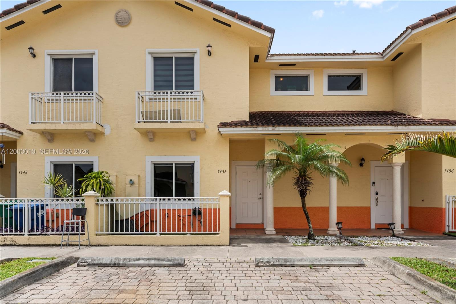 7452 Northwest 178th Street Hialeah, FL 33015 - Photo 21 of 28 a house view with a outdoor space