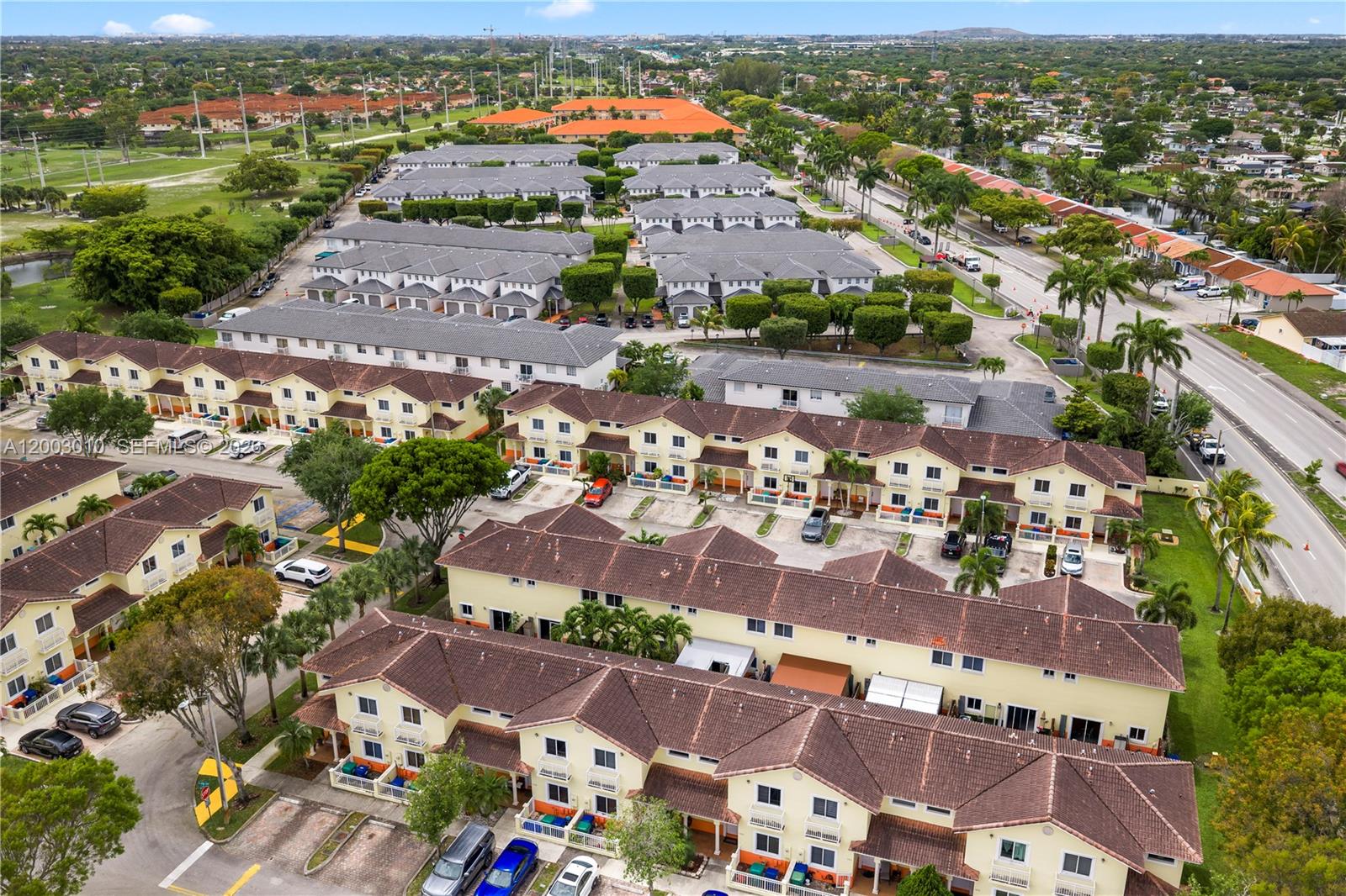 7452 Northwest 178th Street Hialeah, FL 33015 - Photo 22 of 28 an aerial view of residential houses with outdoor space