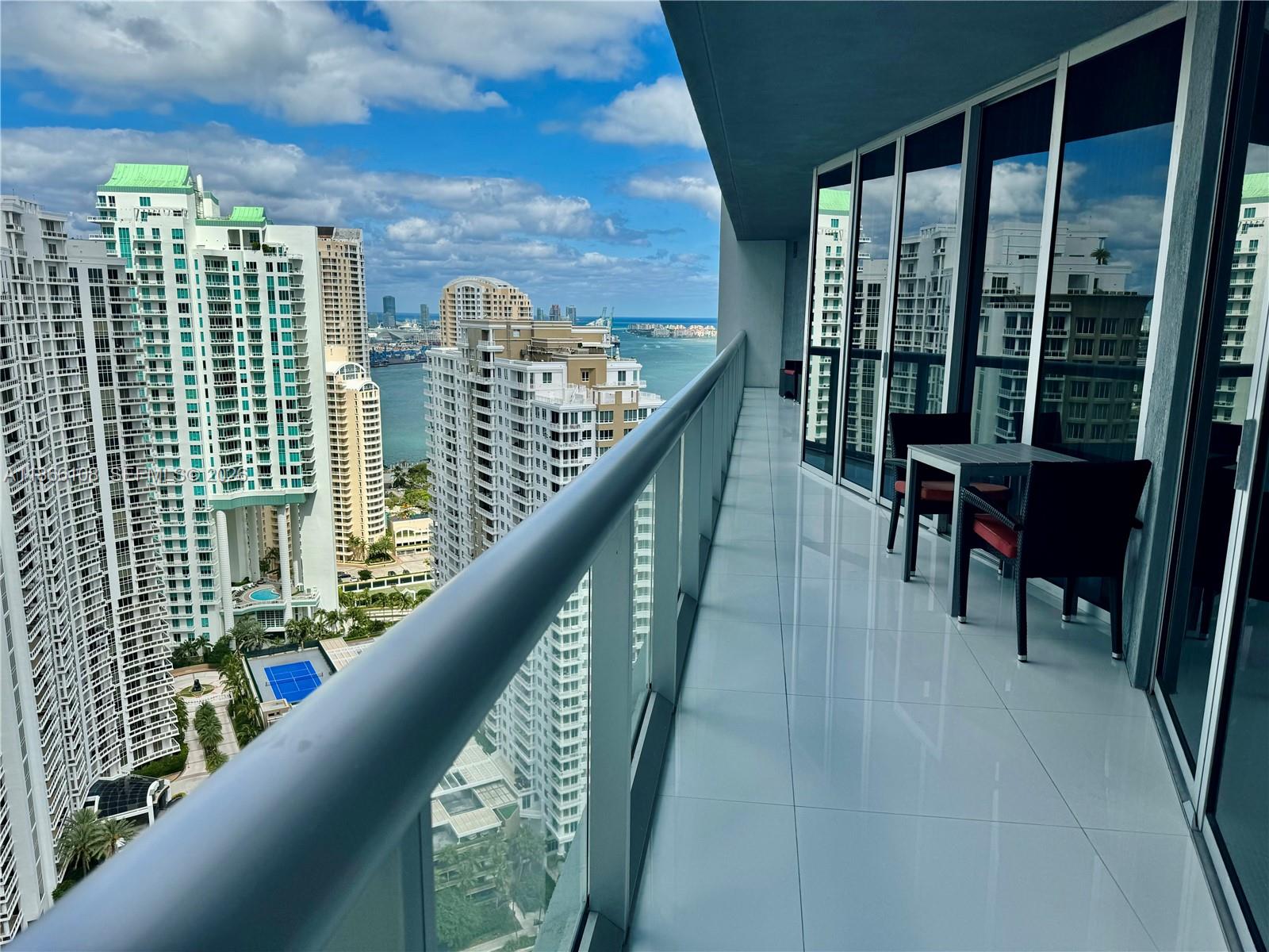 495 Brickell Avenue, Unit 3504 Miami, FL 33131 - Photo 2 of 14 a balcony with outdoor space