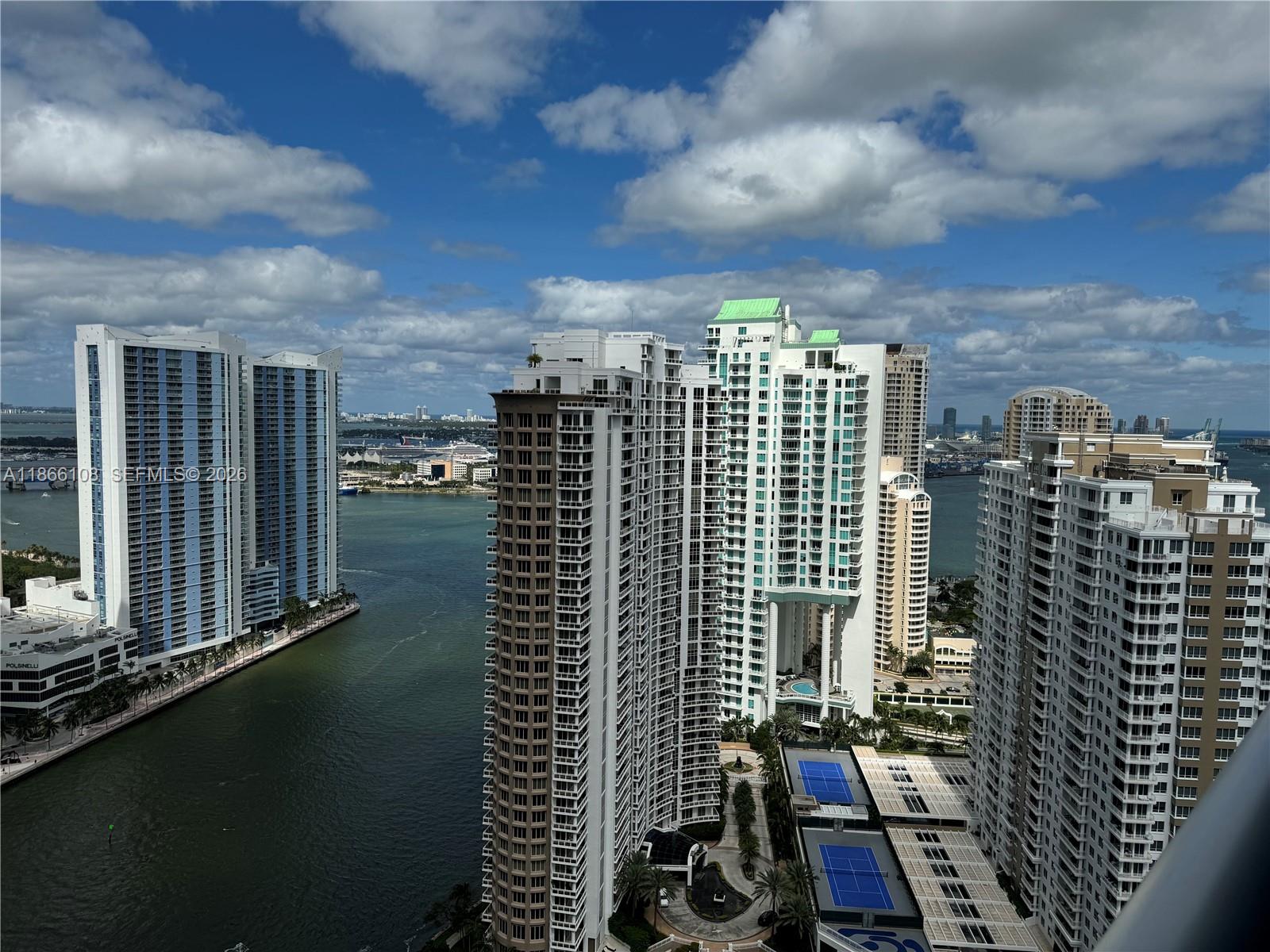 495 Brickell Avenue, Unit 3504 Miami, FL 33131 - Photo 36 of 43 a view of a city with tall buildings