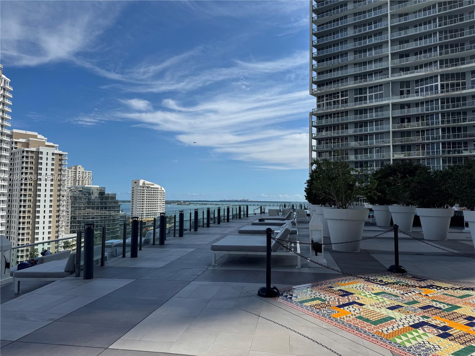 495 Brickell Avenue, Unit 3504 Miami, FL 33131 - Photo 39 of 43 a view of a terrace with sitting area