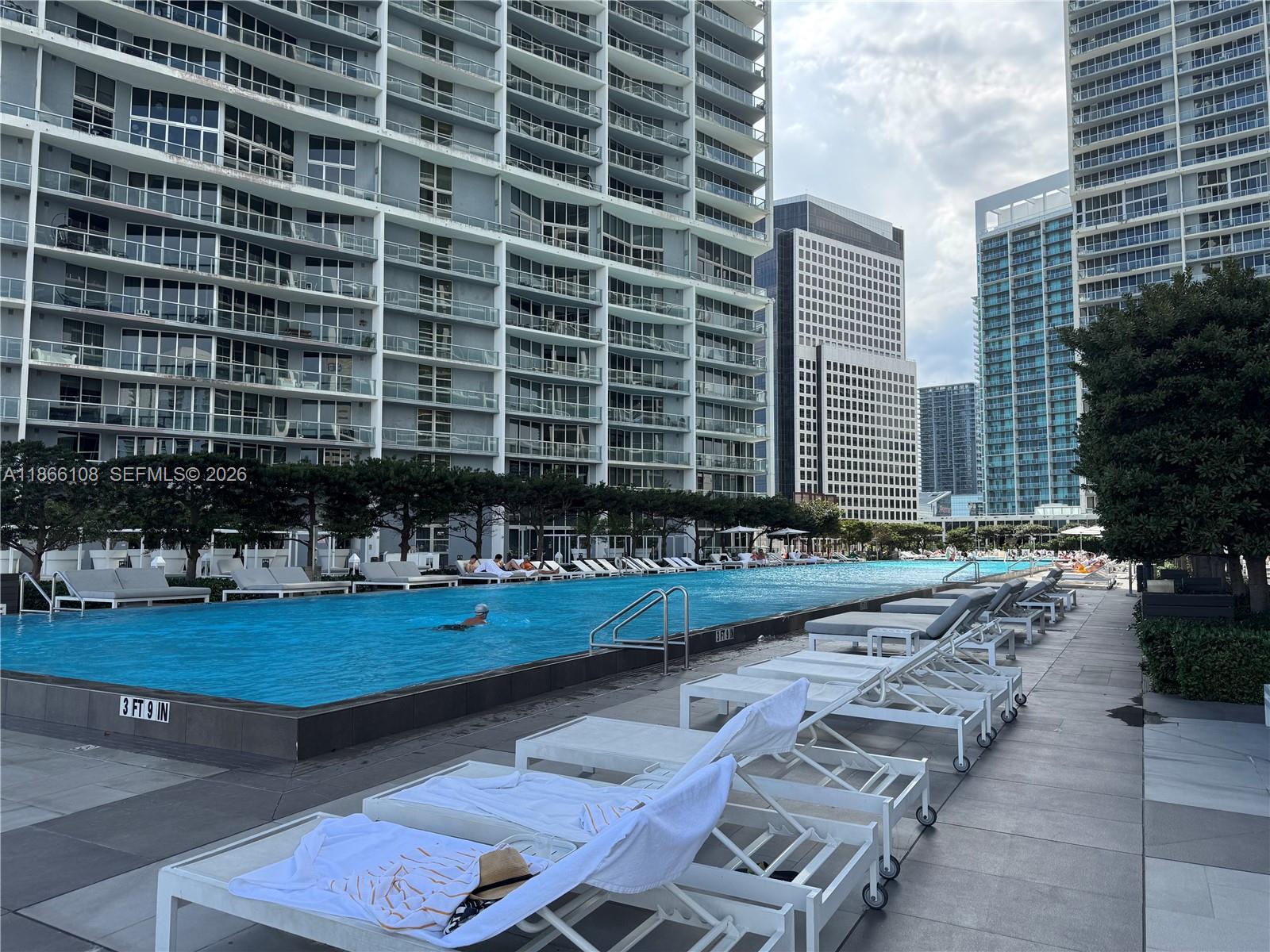 495 Brickell Avenue, Unit 3504 Miami, FL 33131 - Photo 41 of 43 a view of a yard with chairs