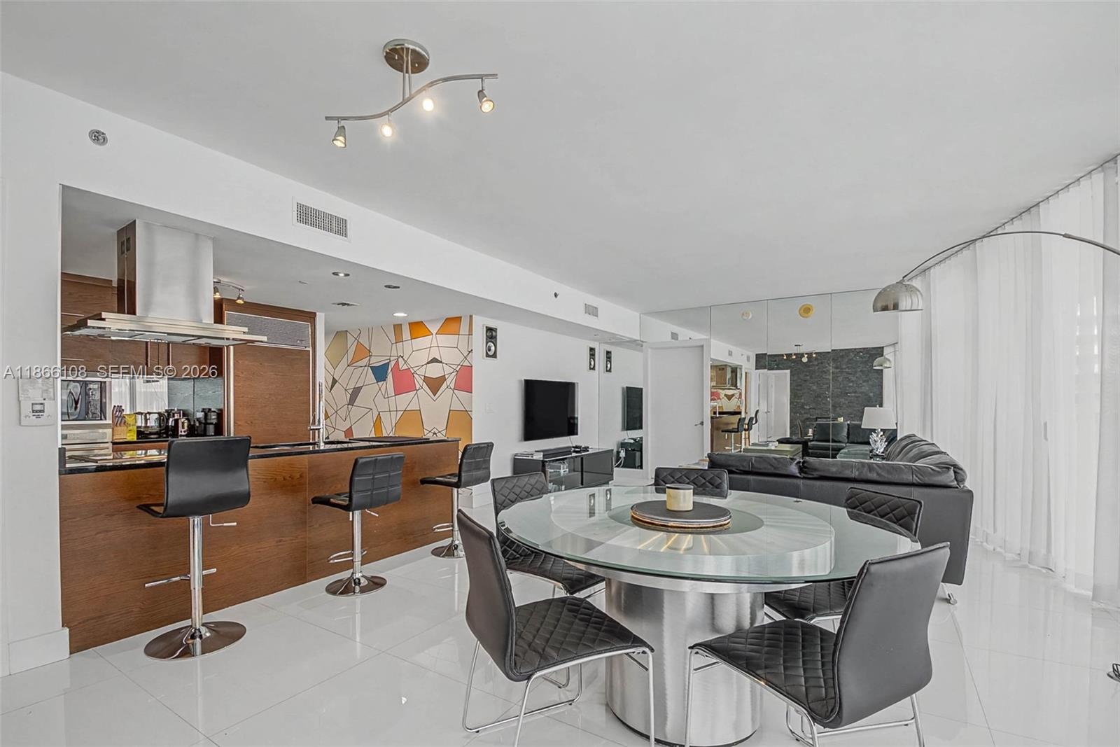 495 Brickell Avenue, Unit 3504 Miami, FL 33131 - Photo 5 of 43 a view of a dining room with furniture