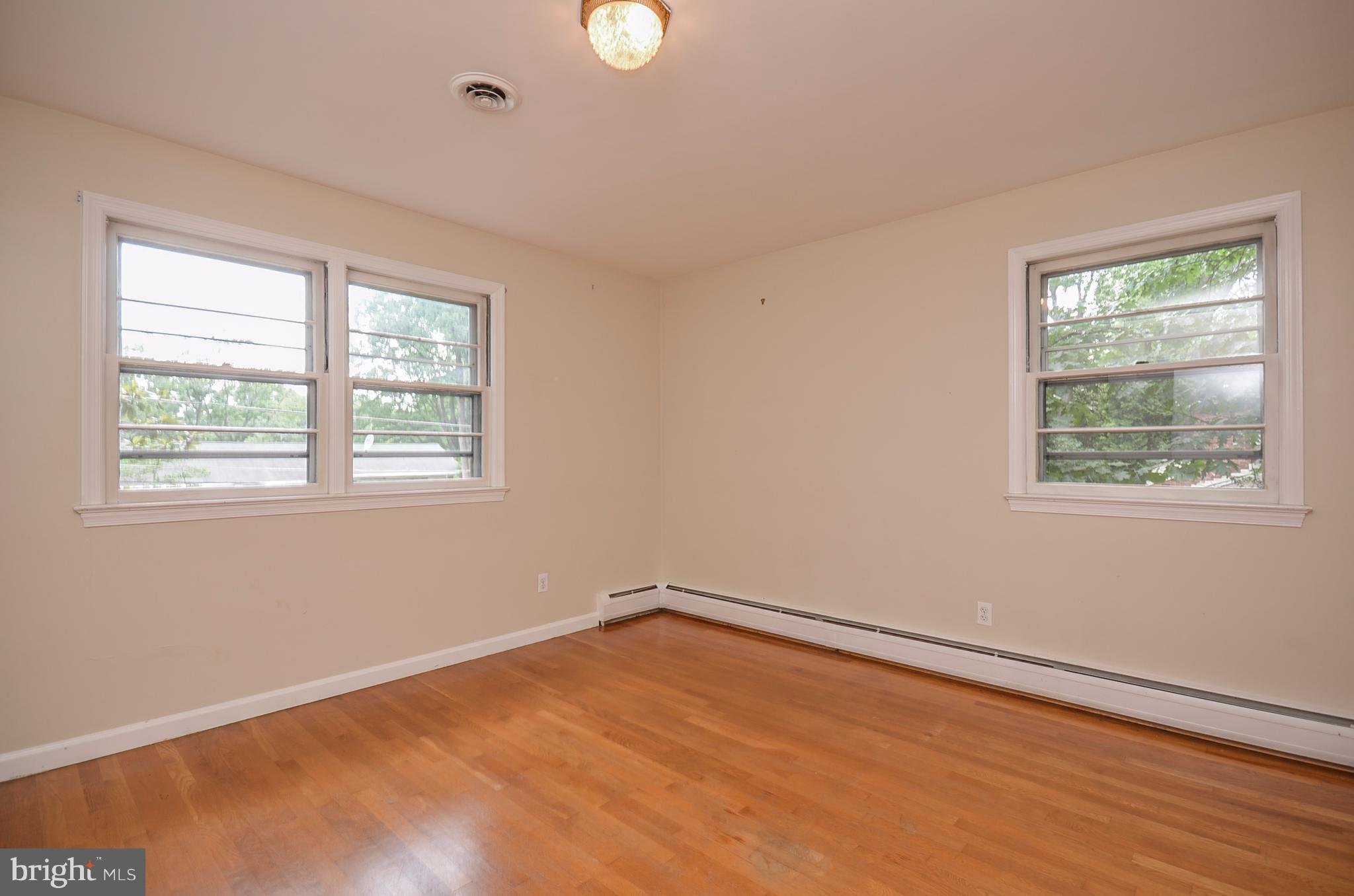 10751 Kinloch Road Silver Spring, MD 20903 - Photo 15 of 30 a view of an empty room with a window