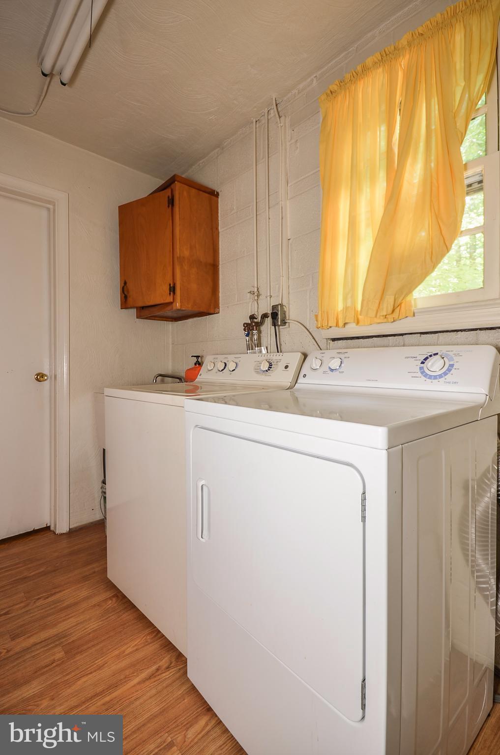 10751 Kinloch Road Silver Spring, MD 20903 - Photo 19 of 30 a bathroom with a sink and a mirror