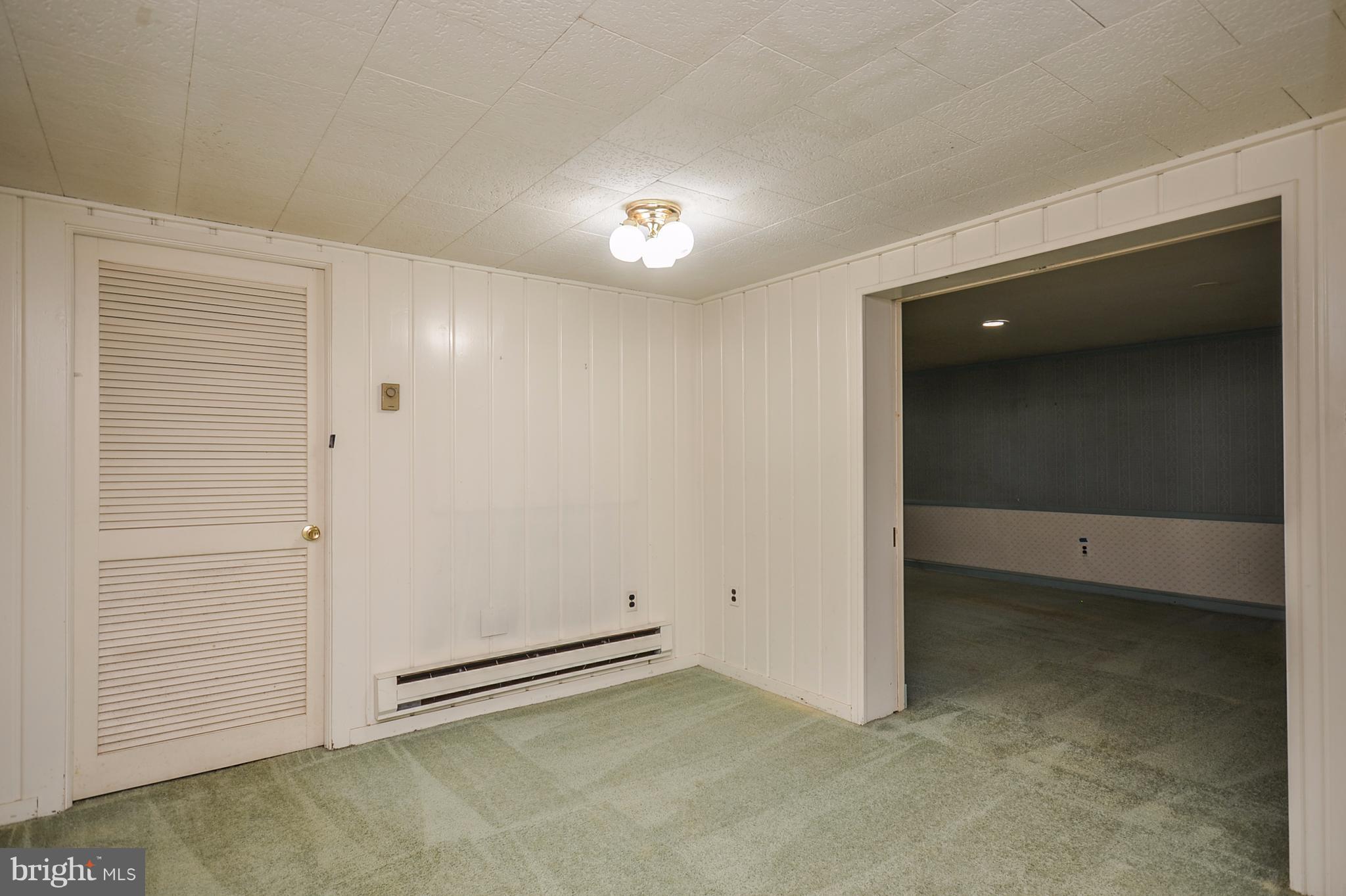 10751 Kinloch Road Silver Spring, MD 20903 - Photo 21 of 30 an empty room with closet