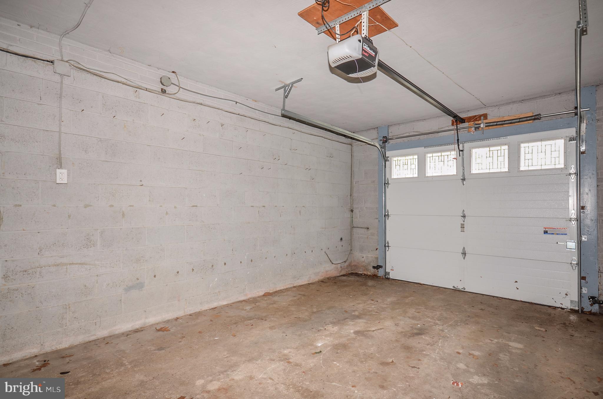 10751 Kinloch Road Silver Spring, MD 20903 - Photo 25 of 30 a view of a room with racks on the wall
