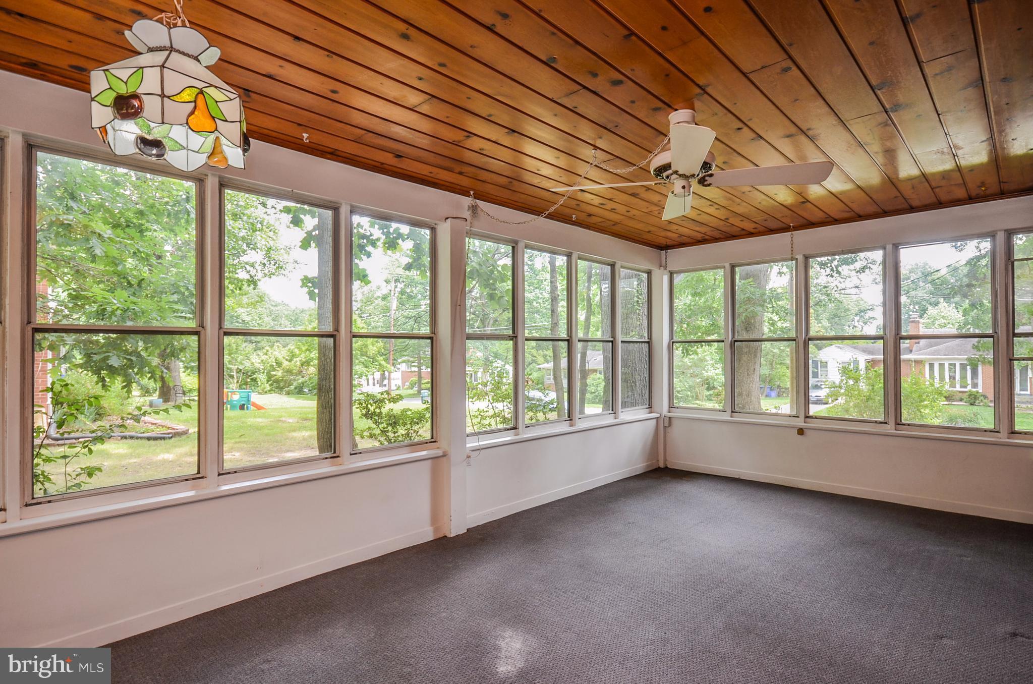 10751 Kinloch Road Silver Spring, MD 20903 - Photo 9 of 30 a view of room with window and furniture