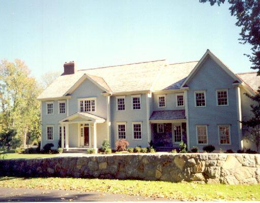 12 Marion Road Westport, CT 06880 - Photo 1 of 1 a front view of a house with a yard