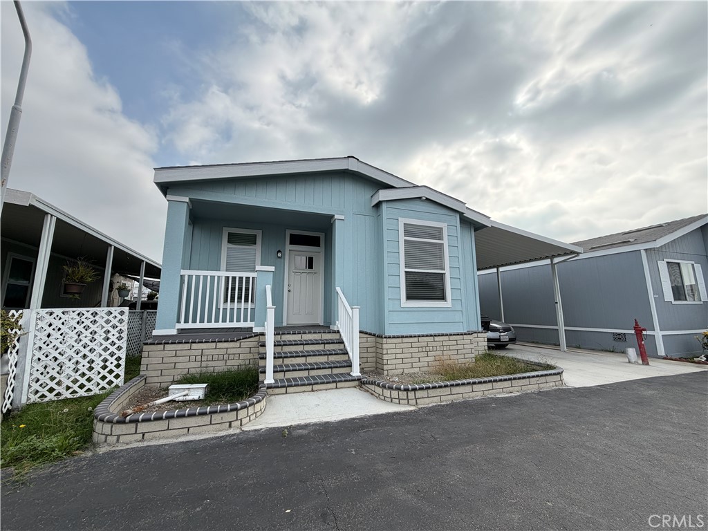 9080 Bloomfield Street, Unit 231 Cypress, CA 90630 - Photo 4 of 20 a house view with a outdoor space