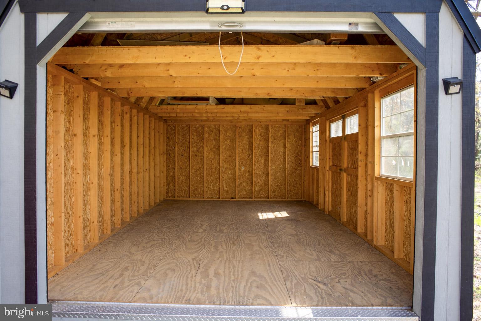 250 Shoemaker Lane Bridgeton, NJ 08302 - Photo 15 of 33 a view of an empty room with wooden floor and a window