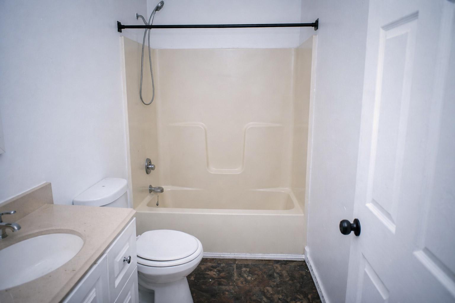 250 Shoemaker Lane Bridgeton, NJ 08302 - Photo 28 of 33 a bathroom with a granite countertop sink toilet and shower