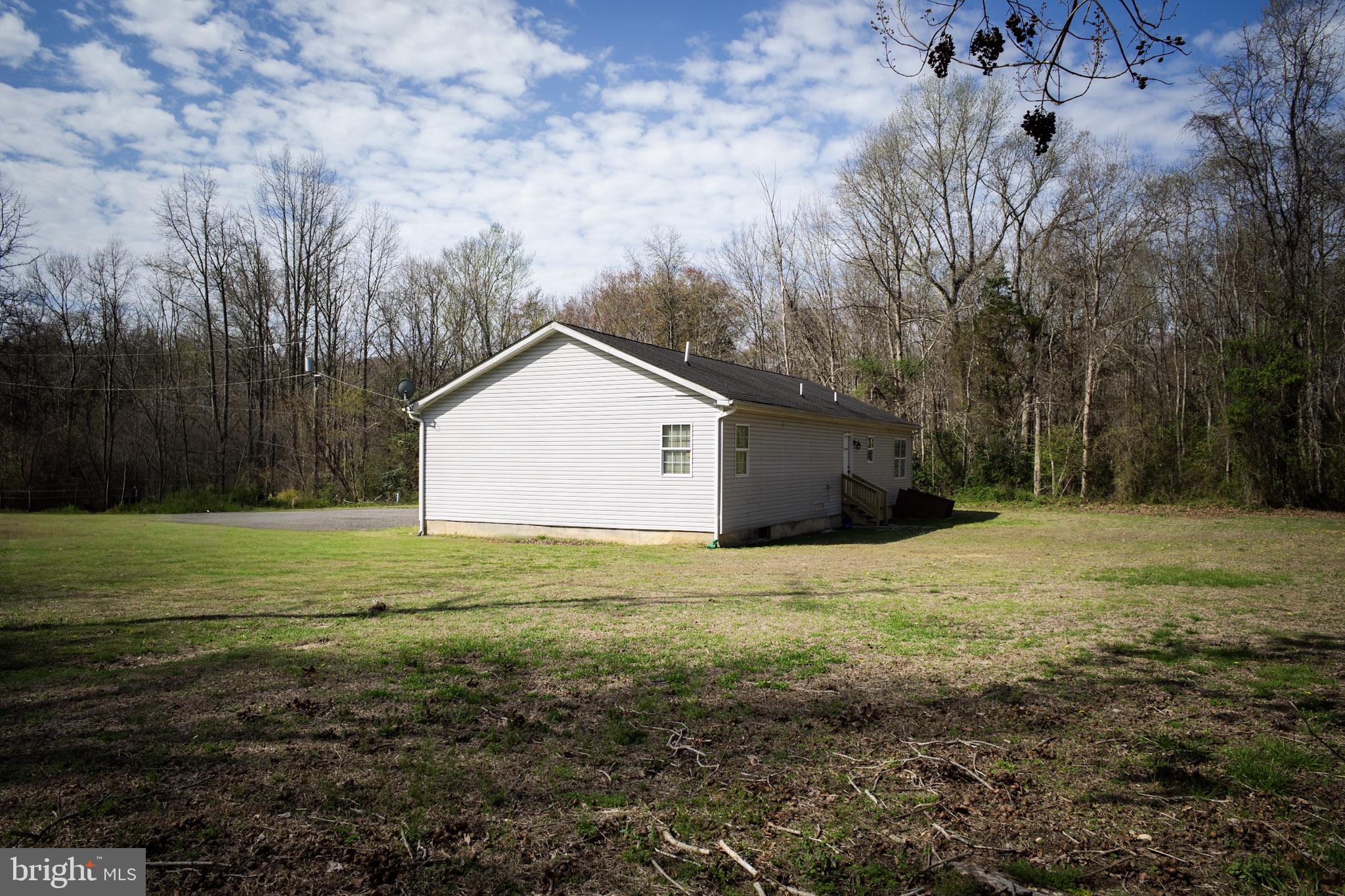 250 Shoemaker Lane Bridgeton, NJ 08302 - Photo 7 of 33 Serene home nestled in nature's embrace.