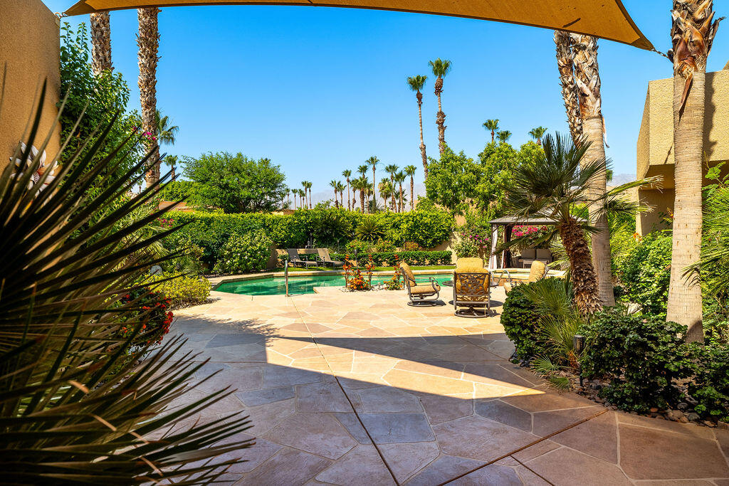 79160 Jack Rabbit Trail La Quinta, CA 92253 - Photo 13 of 48 a view of a backyard of the house