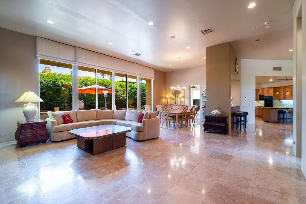 79160 Jack Rabbit Trail La Quinta, CA 92253 - Photo 15 of 48 a living room with furniture and a large window