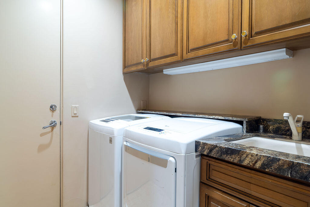 79160 Jack Rabbit Trail La Quinta, CA 92253 - Photo 31 of 48 a utility room with dryer and washer
