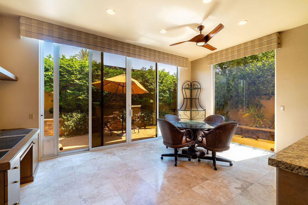 79160 Jack Rabbit Trail La Quinta, CA 92253 - Photo 38 of 48 a dining room with furniture and floor to ceiling window