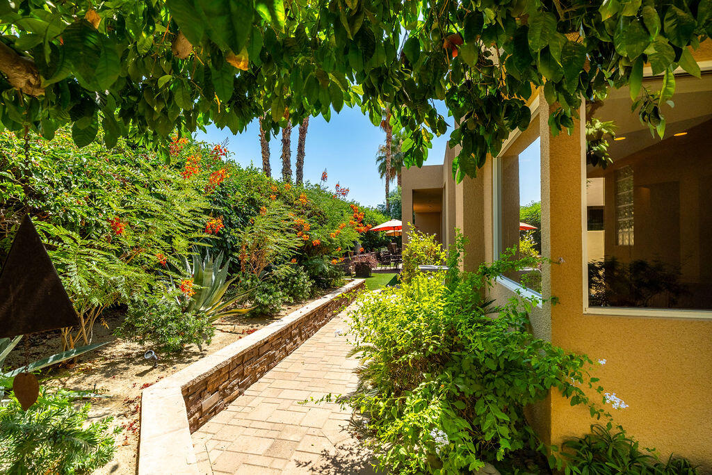 79160 Jack Rabbit Trail La Quinta, CA 92253 - Photo 47 of 48 a view of a garden with a fountain