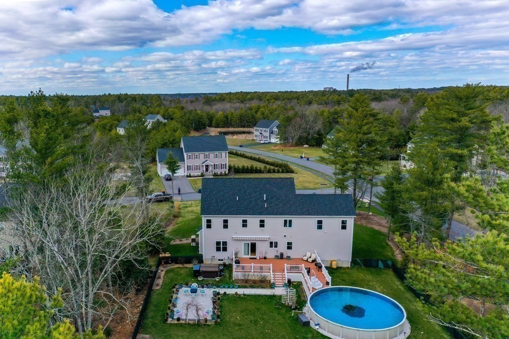 4 Douglas Corner Rochester, MA 02770 - Photo 33 of 42 aerial view of a house with a garden