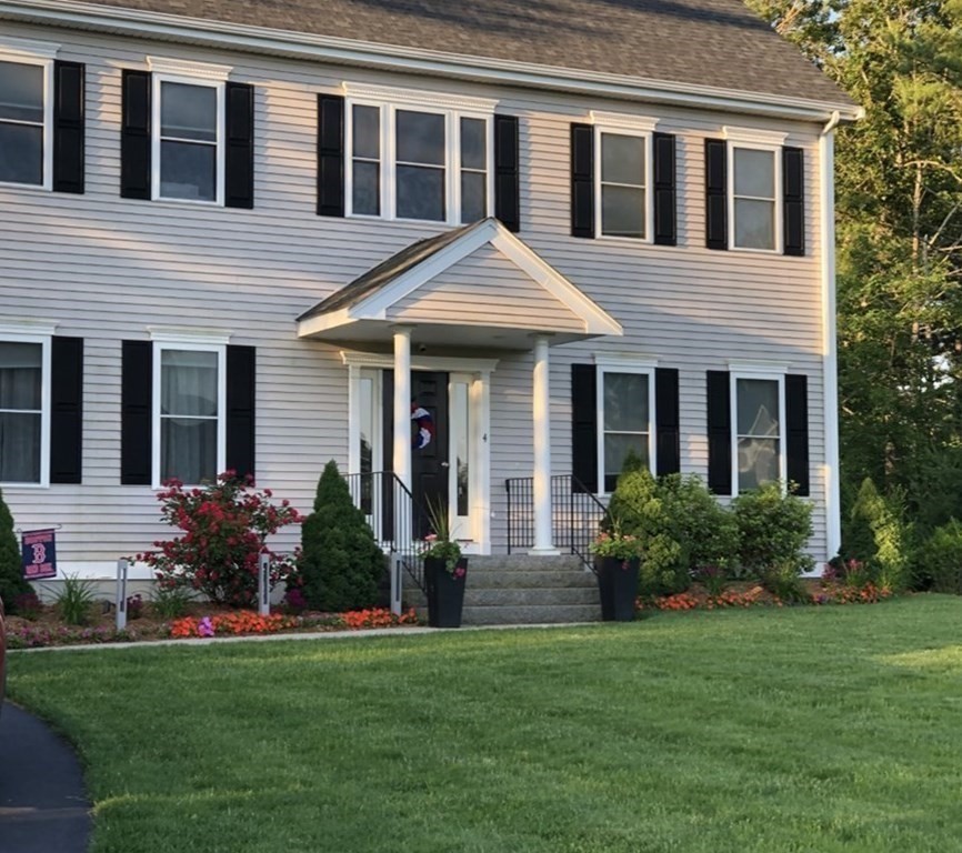 4 Douglas Corner Rochester, MA 02770 - Photo 42 of 42 a front view of a house with garden