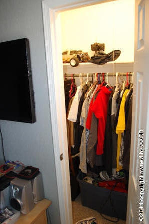 8101 Marni Trail Amarillo, TX 79110 - Photo 18 of 39 a view of walk in closet with clothes and shoes