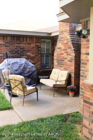 8101 Marni Trail Amarillo, TX 79110 - Photo 39 of 39 a backyard of a house with outdoor seating