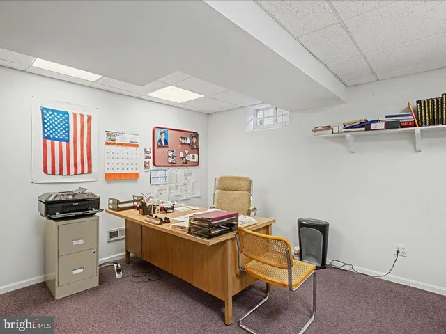 a room with furniture and wooden floor